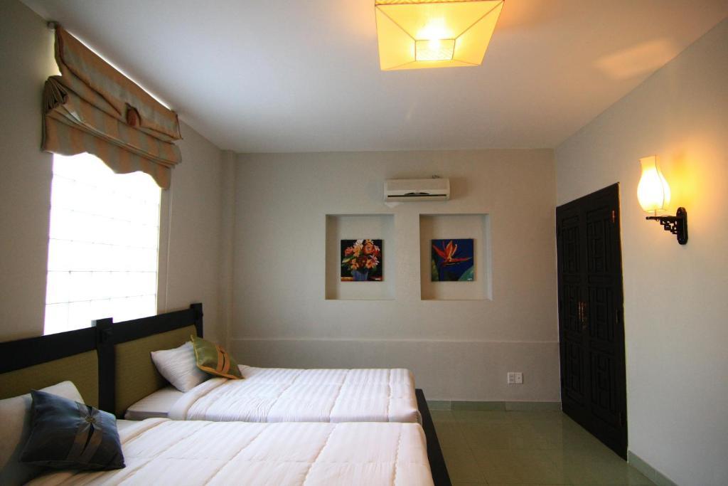 Faifoo Boutique Hotel โฮจิมินห์ซิตี้ ห้อง รูปภาพ